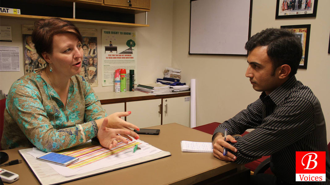 Christie Lauder with Adnan Aamir during interview